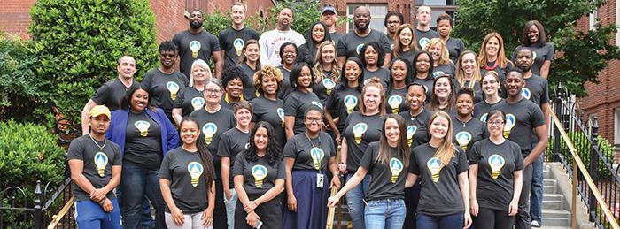 Group of educators with wearing Design Lab t-shirts